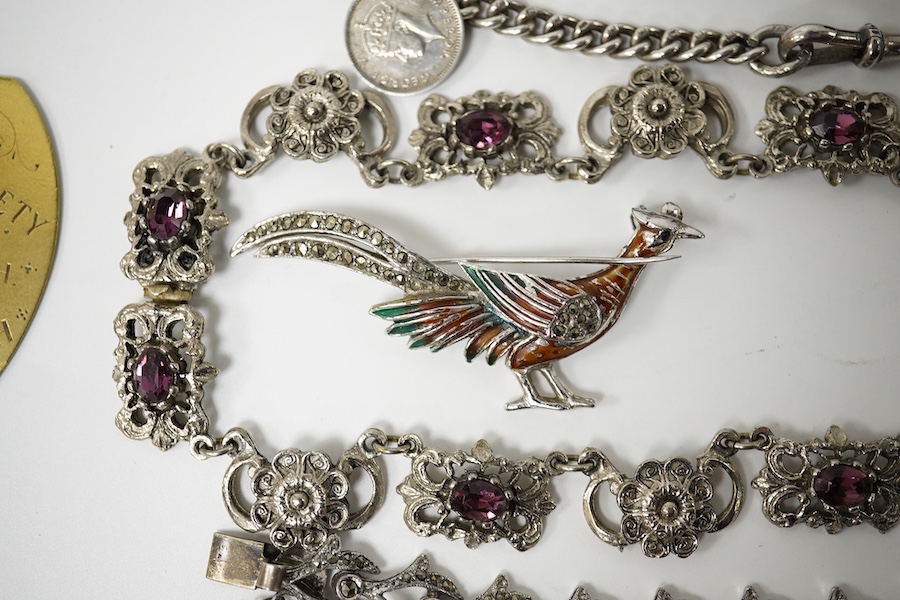 A small quantity of assorted jewellery including a silver charm bracelet, amethyst paste necklace, agate bead necklace and three marcasite set items, etc. Condition - poor to fair to good